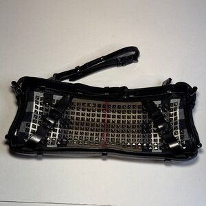 Burberry
Studded House Check Leather Clutch